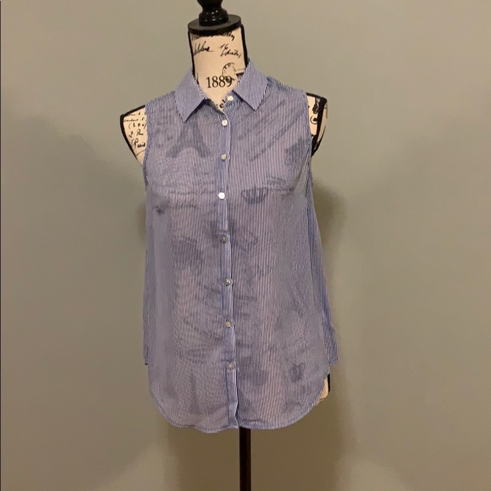 Blue and white striped sleeveless blouse.